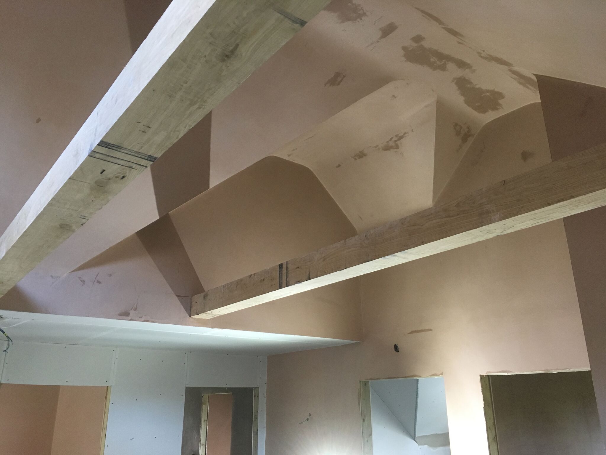 Boarded and skimmed barn conversion ceiling with multiple difficult angles completed by P3 Plastering