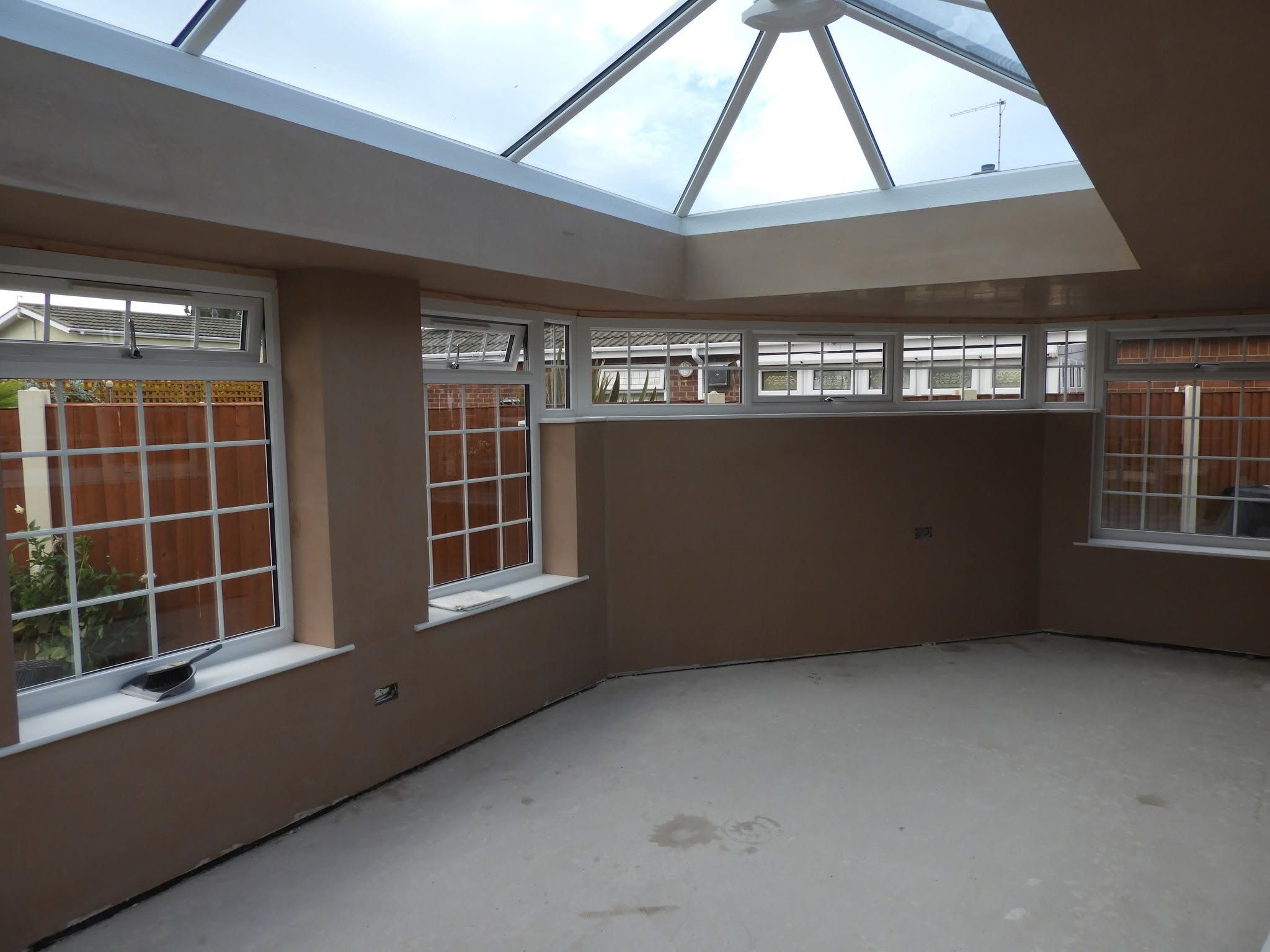 Newly plastered conservatory walls and ceiling area by P3 Plastering