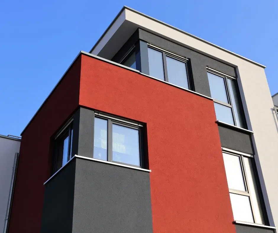 Building exterior finished with coloured acrylic render