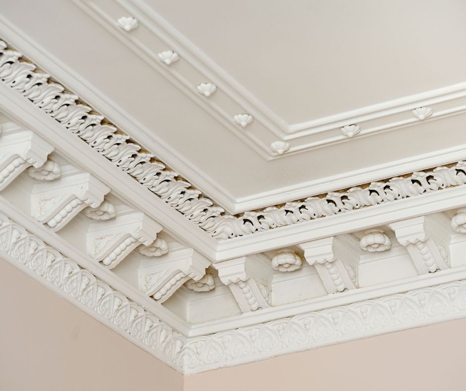 Ornate decorative plaster mouldings with detailed cornice