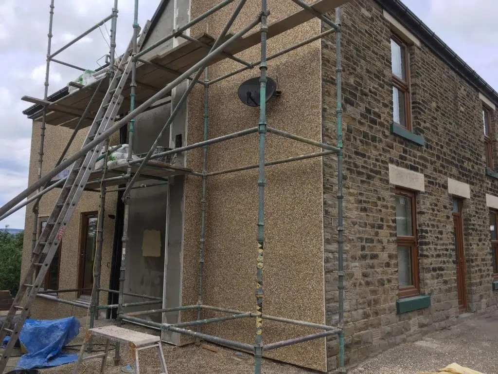 Property exterior with traditional pebbledash render