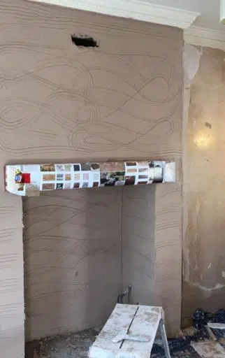 Base coat applied to walls during solid plastering by P3 Plastering